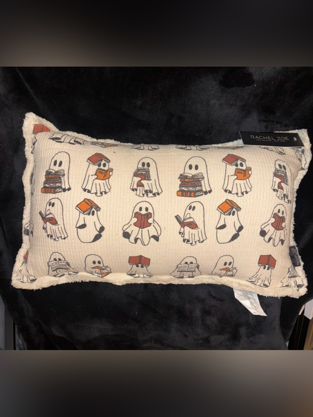 Ghost Reading Books Halloween Holiday Cream Colored Throw Pillow by Rachel Zoe